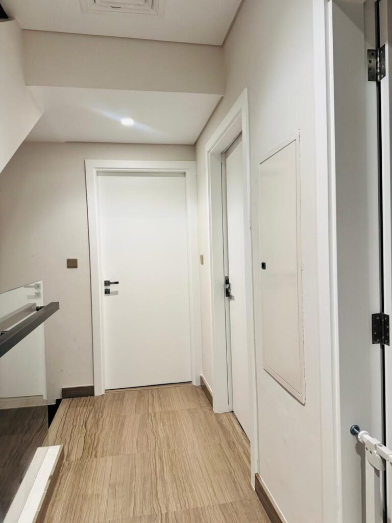 Wrapped interior doors in a villa corridor – Floor Woods Dubai