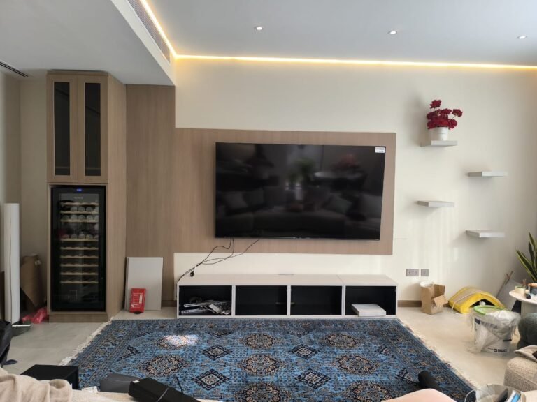 Wood-finish wrapped TV unit and wall panel – Floor Woods Dubai