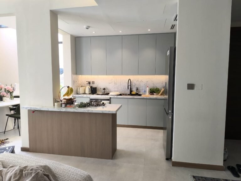 Kitchen island with wood-grain wrap – Floor Woods Dubai